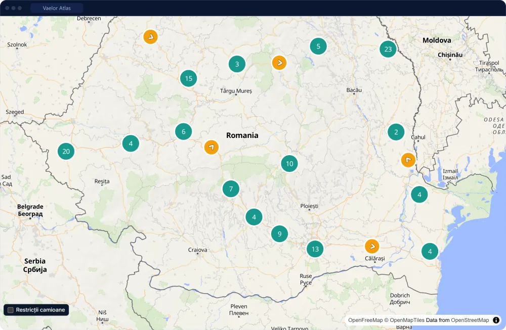 The Atlas live map of Romania with the fleet: vehicles grouped by area in numbered circles and moving trucks marked with arrows.